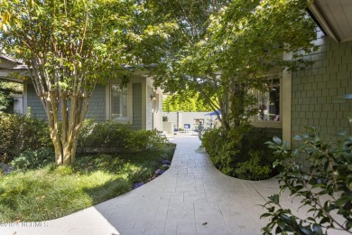 Welcome to this luxurious, Frank Lloyd Wright-inspired home in on Country Club of Landfall in North Carolina - for sale on GolfHomes.com, golf home, golf lot