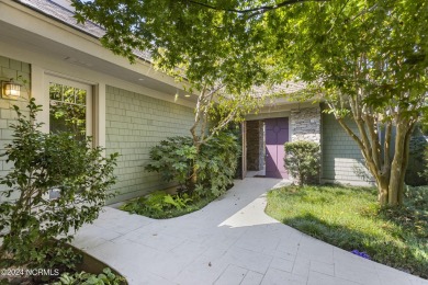 Welcome to this luxurious, Frank Lloyd Wright-inspired home in on Country Club of Landfall in North Carolina - for sale on GolfHomes.com, golf home, golf lot