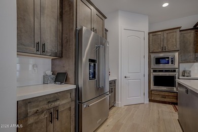 Located in the Wildflower Ridge neighborhood of the prestigious on The Golf Club At Chaparral Pines in Arizona - for sale on GolfHomes.com, golf home, golf lot