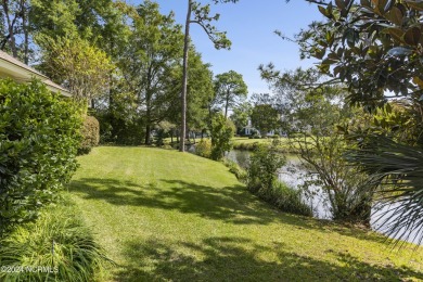 Welcome to this luxurious, Frank Lloyd Wright-inspired home in on Country Club of Landfall in North Carolina - for sale on GolfHomes.com, golf home, golf lot