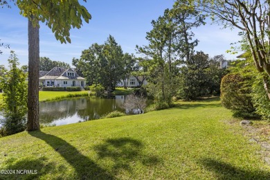 Welcome to this luxurious, Frank Lloyd Wright-inspired home in on Country Club of Landfall in North Carolina - for sale on GolfHomes.com, golf home, golf lot