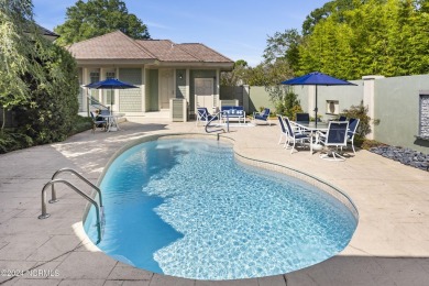 Welcome to this luxurious, Frank Lloyd Wright-inspired home in on Country Club of Landfall in North Carolina - for sale on GolfHomes.com, golf home, golf lot