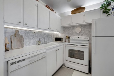 SPECTACULAR CONDO WITH AMAZING WATER VIEW FROM THE 4TH FLOOR on Hillsboro Pines Golf in Florida - for sale on GolfHomes.com, golf home, golf lot