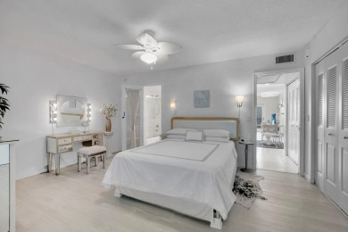 SPECTACULAR CONDO WITH AMAZING WATER VIEW FROM THE 4TH FLOOR on Hillsboro Pines Golf in Florida - for sale on GolfHomes.com, golf home, golf lot