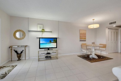 SPECTACULAR CONDO WITH AMAZING WATER VIEW FROM THE 4TH FLOOR on Hillsboro Pines Golf in Florida - for sale on GolfHomes.com, golf home, golf lot