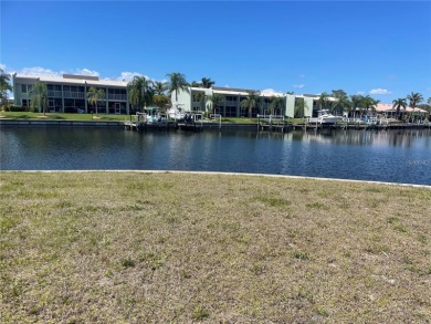 185 Feet of Concrete Seawall with a HUGE water view & Western on Saint Andrews South Golf Club in Florida - for sale on GolfHomes.com, golf home, golf lot