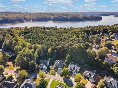 Welcome to your dream retreat within the coveted BridgeMill on Bridgemill Golf Club in Georgia - for sale on GolfHomes.com, golf home, golf lot