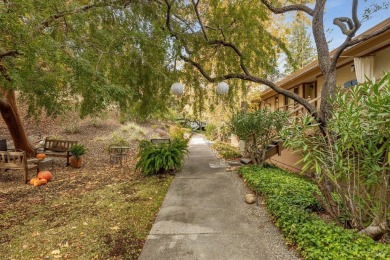 Nestled in an enchanting wooded setting, this beautifully on Rossmoor Golf Course in California - for sale on GolfHomes.com, golf home, golf lot