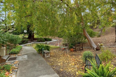 Nestled in an enchanting wooded setting, this beautifully on Rossmoor Golf Course in California - for sale on GolfHomes.com, golf home, golf lot