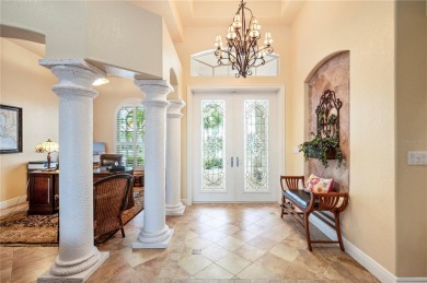 Experience exceptional waterfront living in this custom-built on Twin Isles Country Club in Florida - for sale on GolfHomes.com, golf home, golf lot