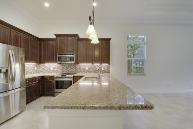 STUNNING BACKYARD VIEWS! This rare 3BR/2.5BA/2CG 'Florenza' on PGA Golf Club in PGA Village in Florida - for sale on GolfHomes.com, golf home, golf lot