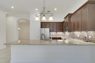 STUNNING BACKYARD VIEWS! This rare 3BR/2.5BA/2CG 'Florenza' on PGA Golf Club in PGA Village in Florida - for sale on GolfHomes.com, golf home, golf lot