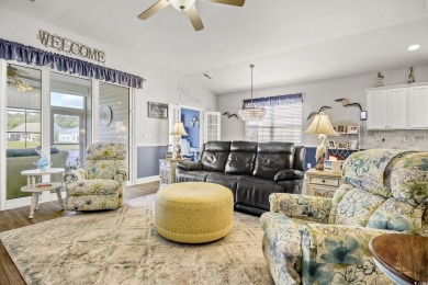 This inviting ranch home is tucked away on a pond-front lot on a on Palmetto Greens Golf and Country Club in South Carolina - for sale on GolfHomes.com, golf home, golf lot