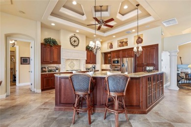Experience exceptional waterfront living in this custom-built on Twin Isles Country Club in Florida - for sale on GolfHomes.com, golf home, golf lot