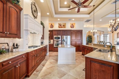 Experience exceptional waterfront living in this custom-built on Twin Isles Country Club in Florida - for sale on GolfHomes.com, golf home, golf lot