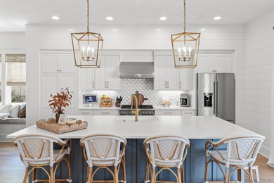 Discover luxury living in the sought-after community of on Origins Golf Club in Florida - for sale on GolfHomes.com, golf home, golf lot