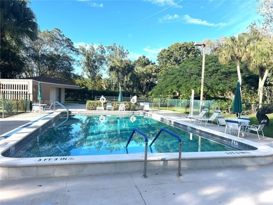 Enjoy easy and comfortable living in this bright 1-bedroom, 1 on Pembroke Lakes Golf Club in Florida - for sale on GolfHomes.com, golf home, golf lot