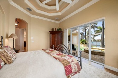 Experience exceptional waterfront living in this custom-built on Twin Isles Country Club in Florida - for sale on GolfHomes.com, golf home, golf lot