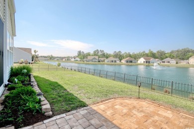 This inviting ranch home is tucked away on a pond-front lot on a on Palmetto Greens Golf and Country Club in South Carolina - for sale on GolfHomes.com, golf home, golf lot
