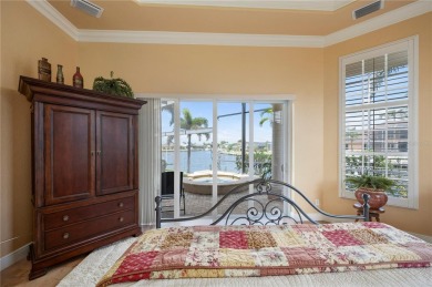 Experience exceptional waterfront living in this custom-built on Twin Isles Country Club in Florida - for sale on GolfHomes.com, golf home, golf lot
