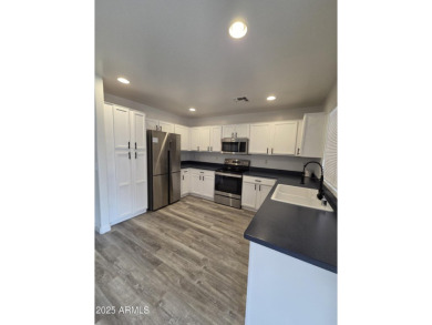 Beautifully remodeled 3 bed, 2 bath home backing to the golf on Coldwater Golf Club in Arizona - for sale on GolfHomes.com, golf home, golf lot