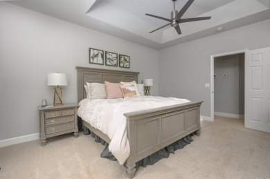 Enjoy effortless, single-level living in this thoughtfully on Great Waters Course At Reynolds Plantation in Georgia - for sale on GolfHomes.com, golf home, golf lot