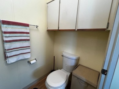 This beautifully maintained 2-bedroom, 2-bathroom Homes of Merit on Lake Henry Golf Club in Florida - for sale on GolfHomes.com, golf home, golf lot