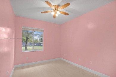 Beautiful 4-bedroom, 3-bath home nestled in the serene, gated on Keys Gate Golf Club in Florida - for sale on GolfHomes.com, golf home, golf lot