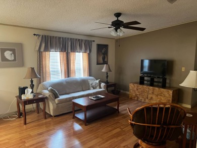 This beautifully maintained 2-bedroom, 2-bathroom Homes of Merit on Lake Henry Golf Club in Florida - for sale on GolfHomes.com, golf home, golf lot