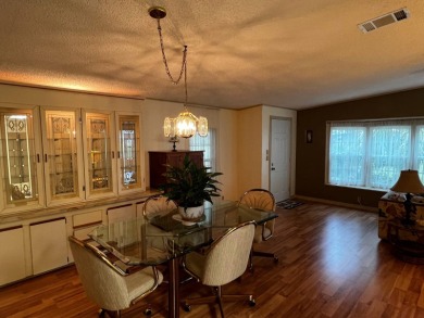 This beautifully maintained 2-bedroom, 2-bathroom Homes of Merit on Lake Henry Golf Club in Florida - for sale on GolfHomes.com, golf home, golf lot