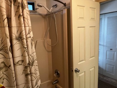 This beautifully maintained 2-bedroom, 2-bathroom Homes of Merit on Lake Henry Golf Club in Florida - for sale on GolfHomes.com, golf home, golf lot
