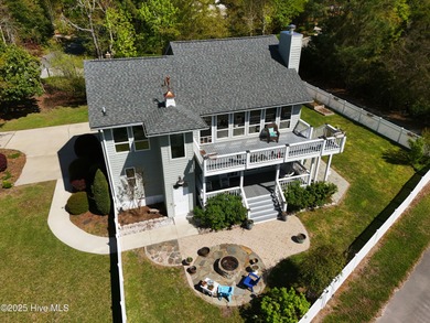 Stunning 4-bedroom, 3.5-bathroom home nestled on Hole 15 of the on Brandywine Bay Golf Club in North Carolina - for sale on GolfHomes.com, golf home, golf lot