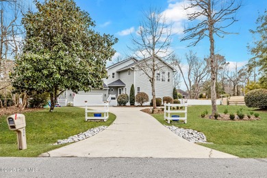 Stunning 4-bedroom, 3.5-bathroom home nestled on Hole 15 of the on Brandywine Bay Golf Club in North Carolina - for sale on GolfHomes.com, golf home, golf lot