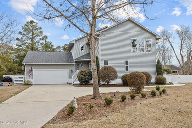 Stunning 4-bedroom, 3.5-bathroom home nestled on Hole 15 of the on Brandywine Bay Golf Club in North Carolina - for sale on GolfHomes.com, golf home, golf lot