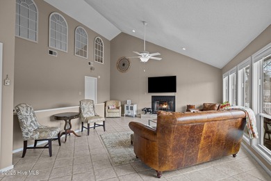 Stunning 4-bedroom, 3.5-bathroom home nestled on Hole 15 of the on Brandywine Bay Golf Club in North Carolina - for sale on GolfHomes.com, golf home, golf lot