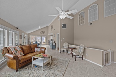 Stunning 4-bedroom, 3.5-bathroom home nestled on Hole 15 of the on Brandywine Bay Golf Club in North Carolina - for sale on GolfHomes.com, golf home, golf lot