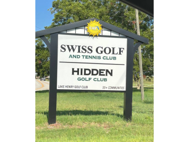 This beautifully maintained 2-bedroom, 2-bathroom Homes of Merit on Lake Henry Golf Club in Florida - for sale on GolfHomes.com, golf home, golf lot
