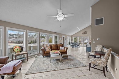 Stunning 4-bedroom, 3.5-bathroom home nestled on Hole 15 of the on Brandywine Bay Golf Club in North Carolina - for sale on GolfHomes.com, golf home, golf lot