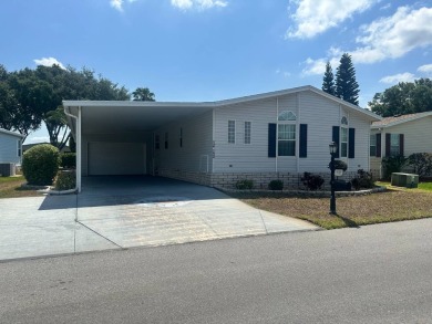 BEAUTIFUL 3 BEDROOM HOME ON GOLF COURSE WITH A GARAGE - REDUCED on Four Lakes Golf Club in Florida - for sale on GolfHomes.com, golf home, golf lot