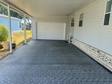 BEAUTIFUL 3 BEDROOM HOME ON GOLF COURSE WITH A GARAGE - REDUCED on Four Lakes Golf Club in Florida - for sale on GolfHomes.com, golf home, golf lot