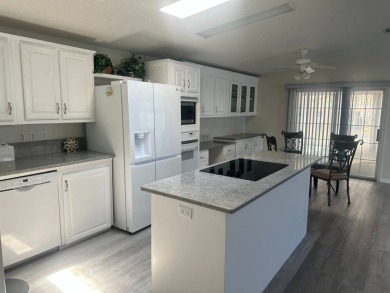 BEAUTIFUL 3 BEDROOM HOME ON GOLF COURSE WITH A GARAGE - REDUCED on Four Lakes Golf Club in Florida - for sale on GolfHomes.com, golf home, golf lot