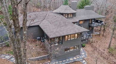 This exceptional mountain estate is a true architectural on Big Canoe Golf Club - Cherokee in Georgia - for sale on GolfHomes.com, golf home, golf lot