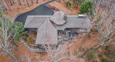This exceptional mountain estate is a true architectural on Big Canoe Golf Club - Cherokee in Georgia - for sale on GolfHomes.com, golf home, golf lot
