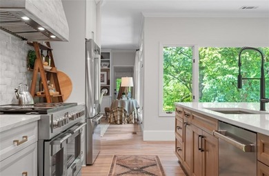 This exceptional mountain estate is a true architectural on Big Canoe Golf Club - Cherokee in Georgia - for sale on GolfHomes.com, golf home, golf lot