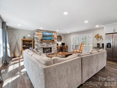 This recently renovated home with an open concept living space on Rumbling Bald Resort on Lake Lure in North Carolina - for sale on GolfHomes.com, golf home, golf lot