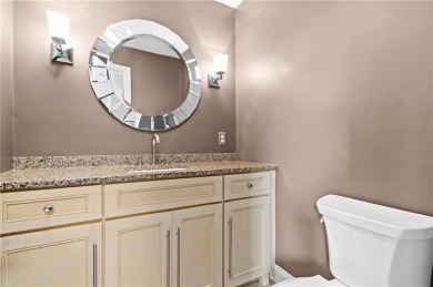 Don't miss out on this updated condo overlooking the peaceful on Louisquisset Golf Club in Rhode Island - for sale on GolfHomes.com, golf home, golf lot