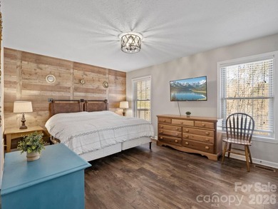 This recently renovated home with an open concept living space on Rumbling Bald Resort on Lake Lure in North Carolina - for sale on GolfHomes.com, golf home, golf lot