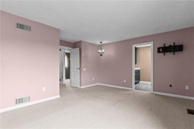 Don't miss out on this updated condo overlooking the peaceful on Louisquisset Golf Club in Rhode Island - for sale on GolfHomes.com, golf home, golf lot