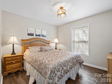 This recently renovated home with an open concept living space on Rumbling Bald Resort on Lake Lure in North Carolina - for sale on GolfHomes.com, golf home, golf lot