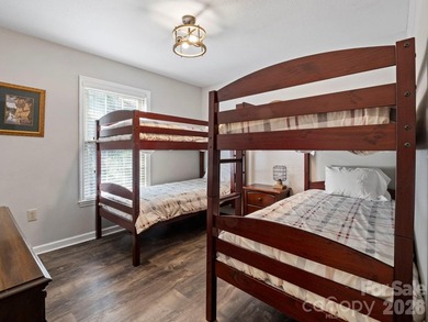 This recently renovated home with an open concept living space on Rumbling Bald Resort on Lake Lure in North Carolina - for sale on GolfHomes.com, golf home, golf lot